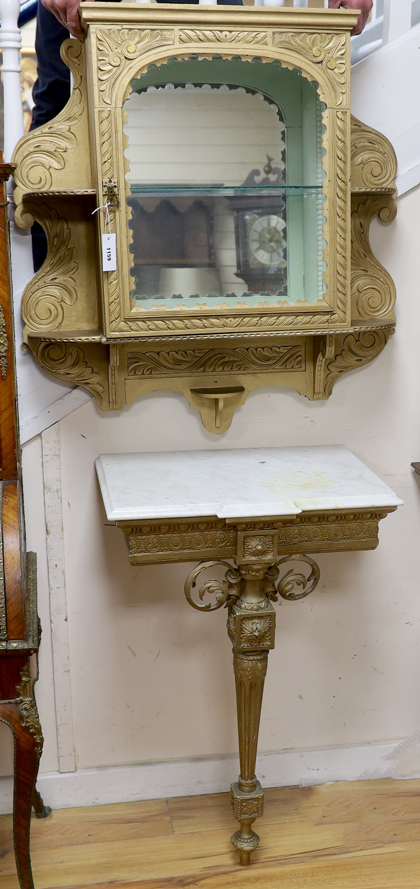 A Victorian giltwood and composition marble topped breakfront console table, with associated wall cabinet, cabinet width 82cm, depth 24cm, combined height 178cm
